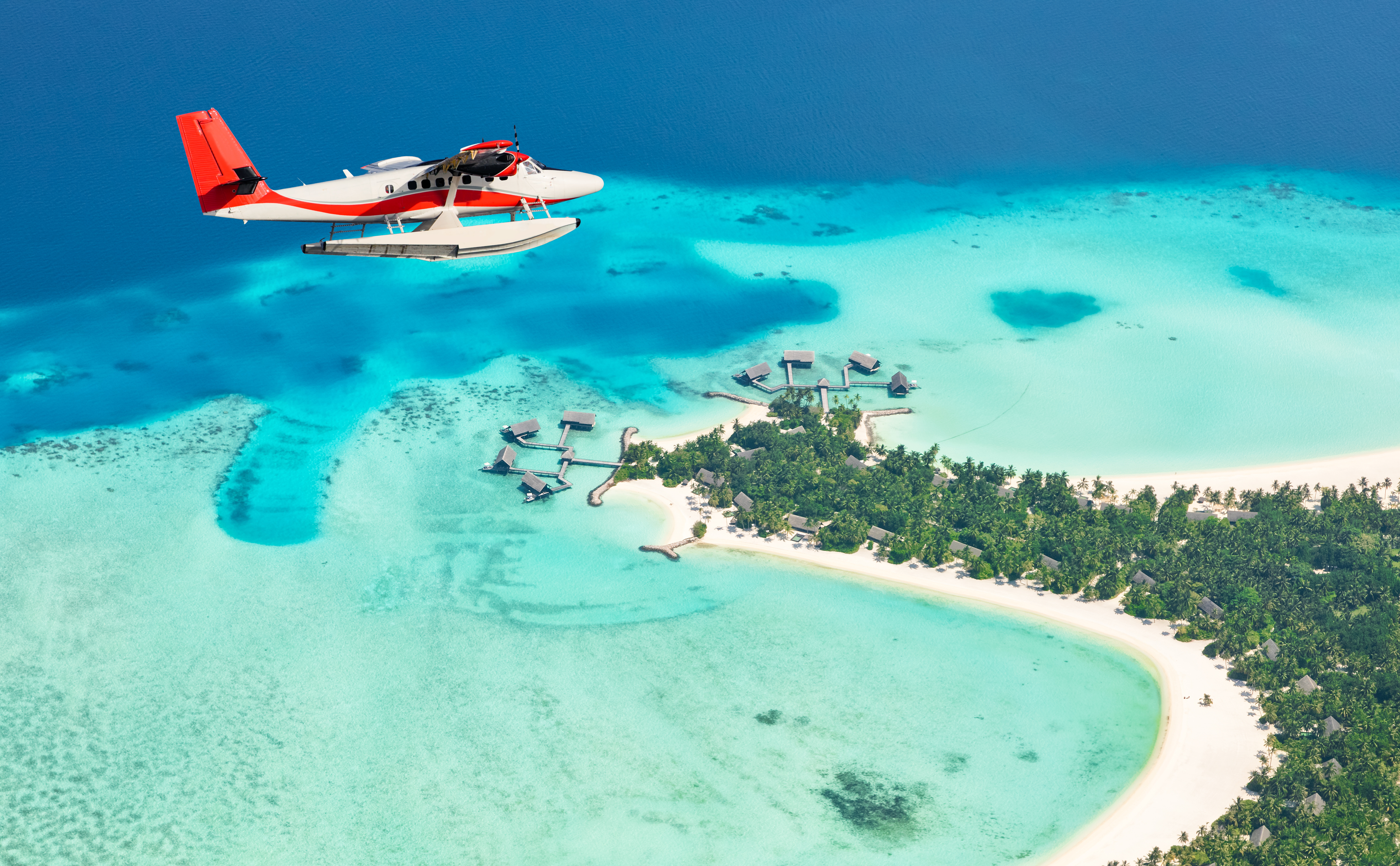 sea-plane-flying-above-maldives-islands_104184141.jpeg