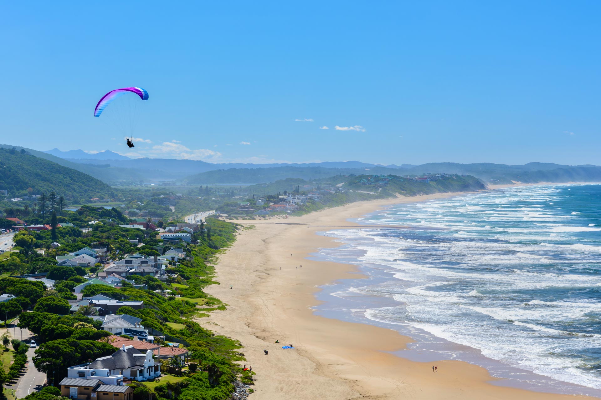 paragliding-over-Wilderness-beach-on-the-garden-route-south-africa-AdobeStock_190056504.jpg