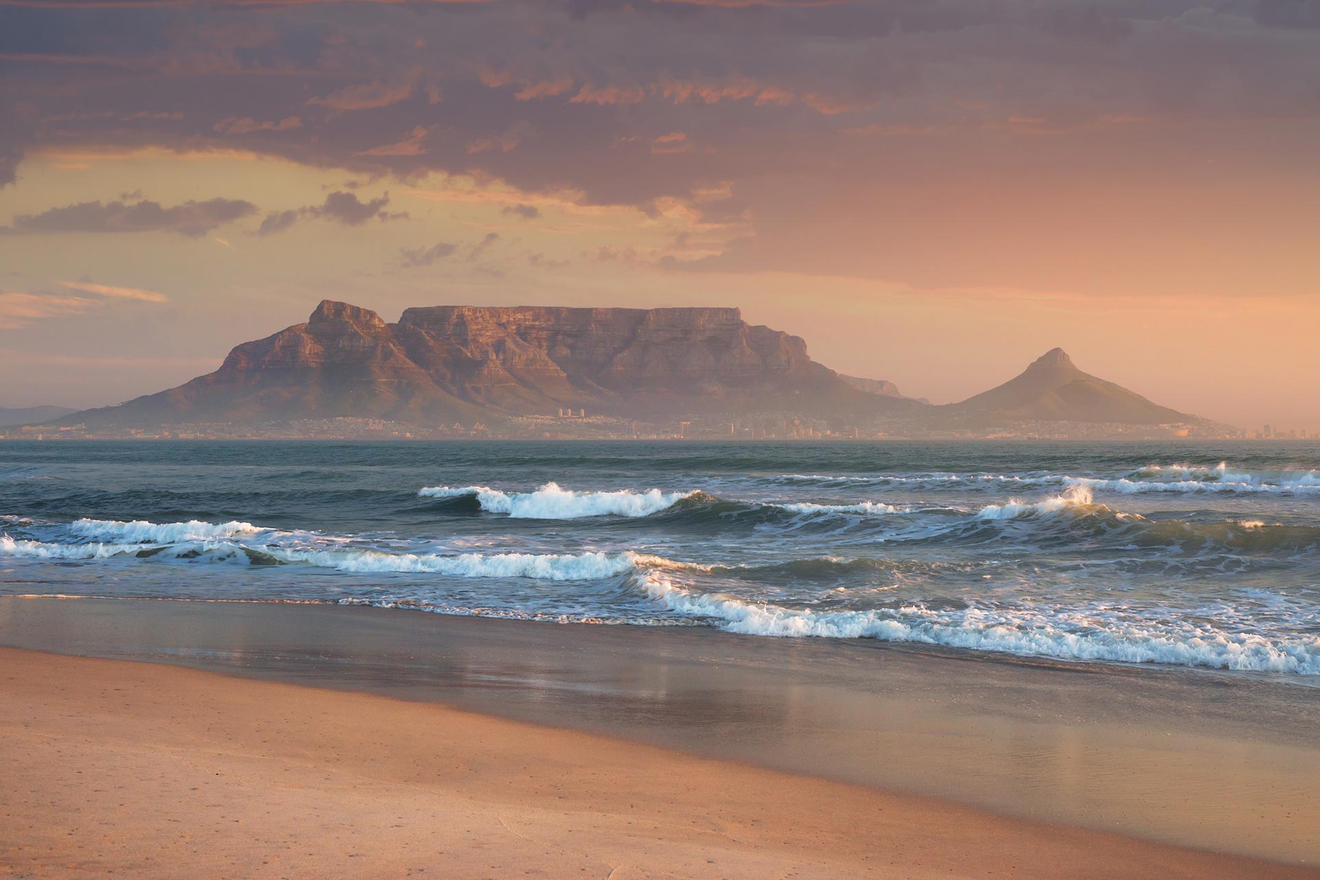 sunset-beach-near-cape-town-view-to-table-mountain-by-sergey-ryzhkov-AdobeStock_277938221.jpg