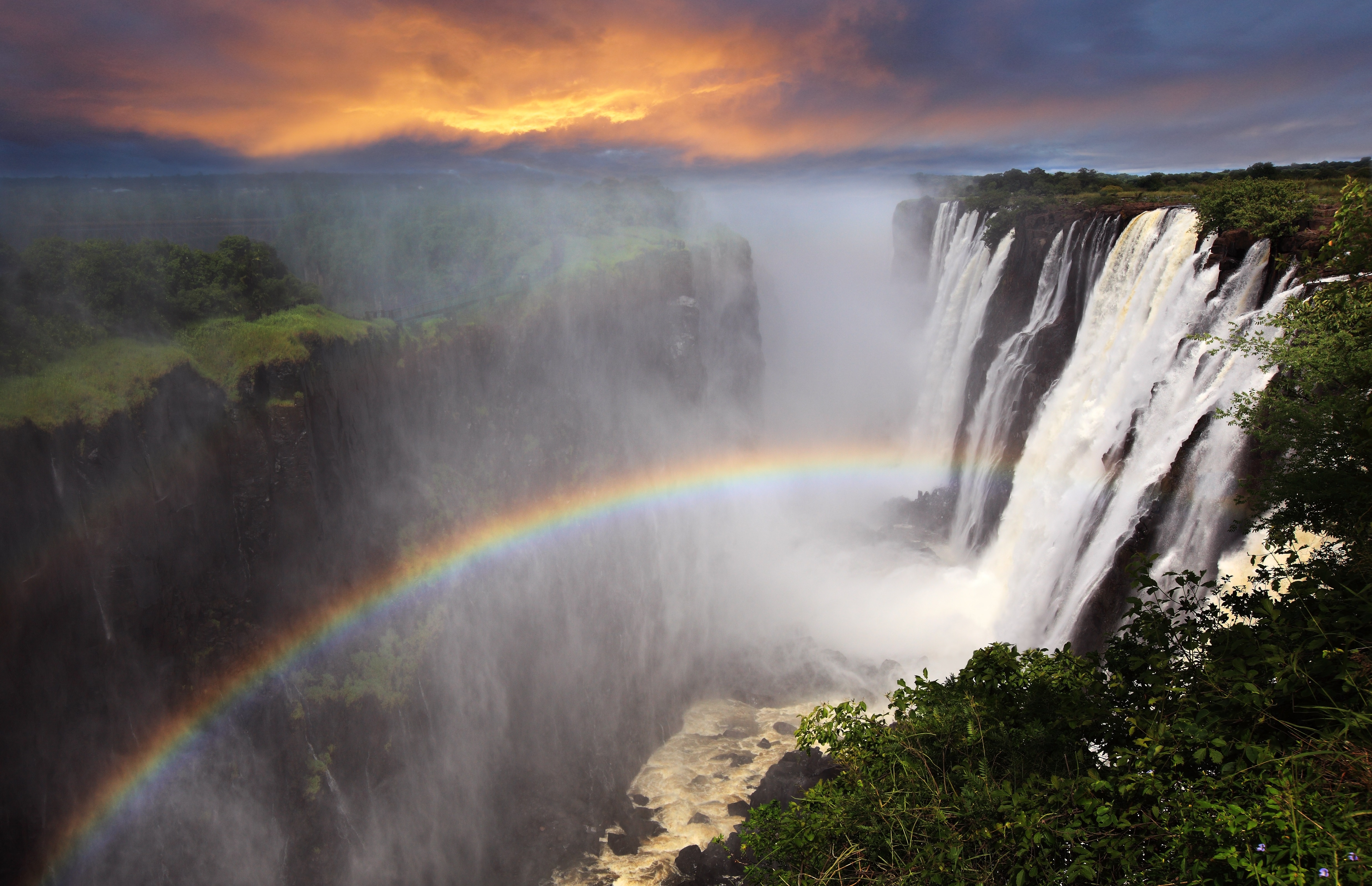 victoria-falls-sunset-with-rainbow-zambia231816934-1.jpeg